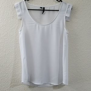 MNG's white sleeveless blouse